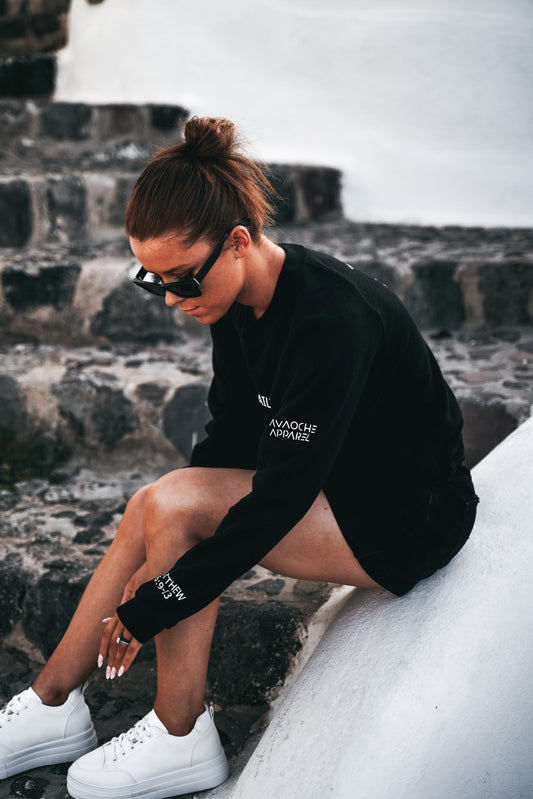 Woman wearing grey “Pray Daily” crewneck – minimal Christian sweatshirt