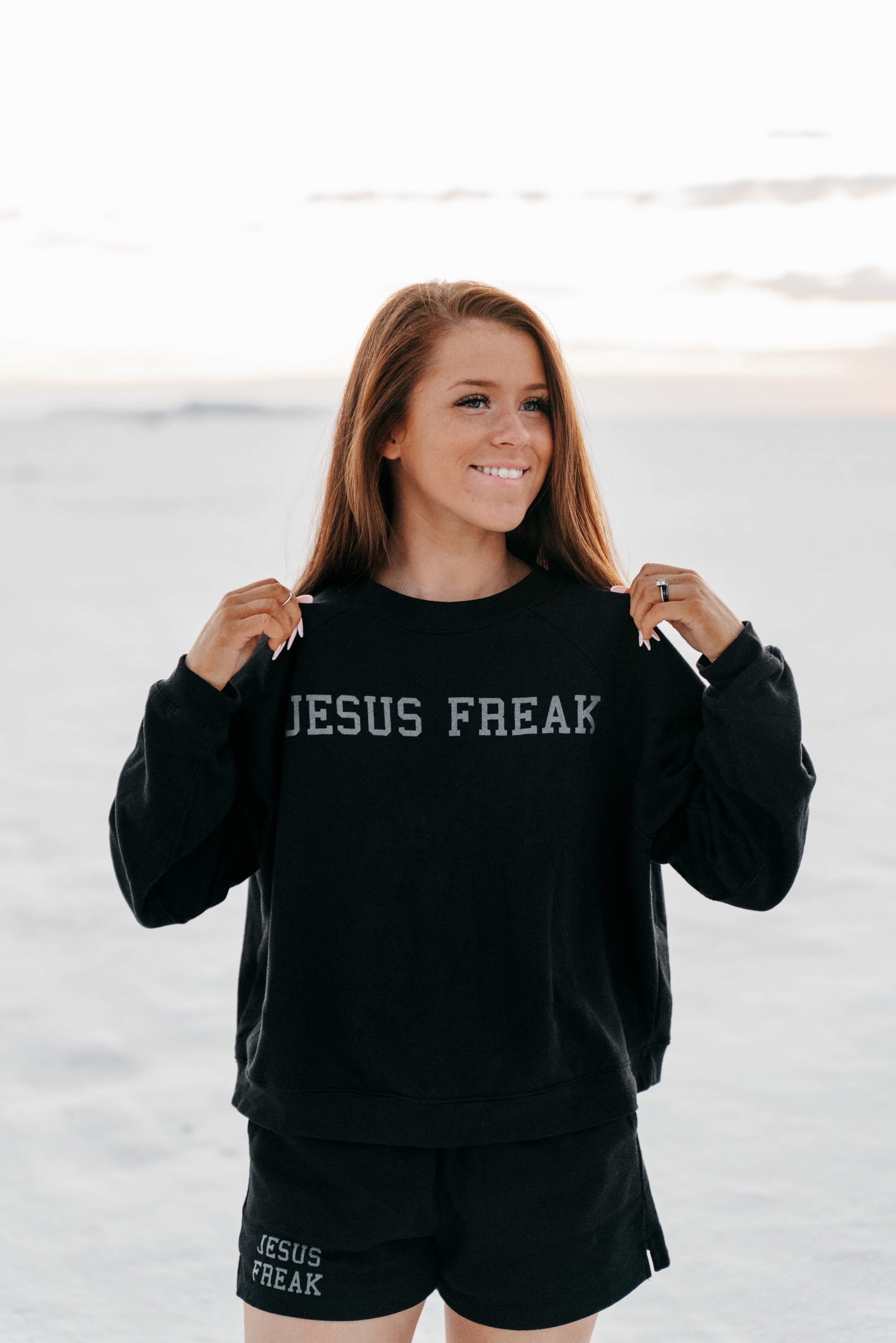 Woman wearing “Jesus Freak” lounge set – bold Christian comfortwear