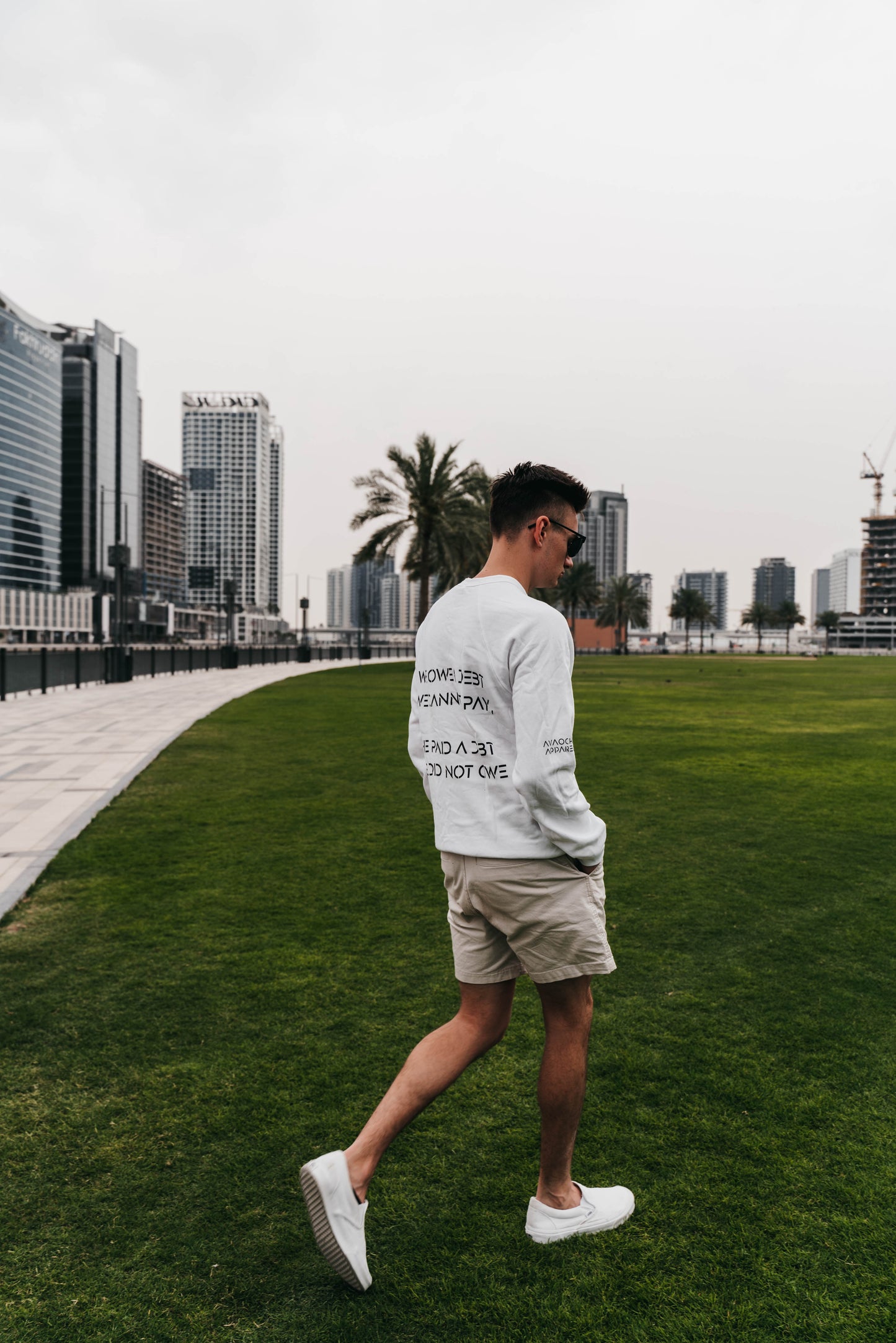 " WE OWE A DEBT.. " Men's White Crewneck