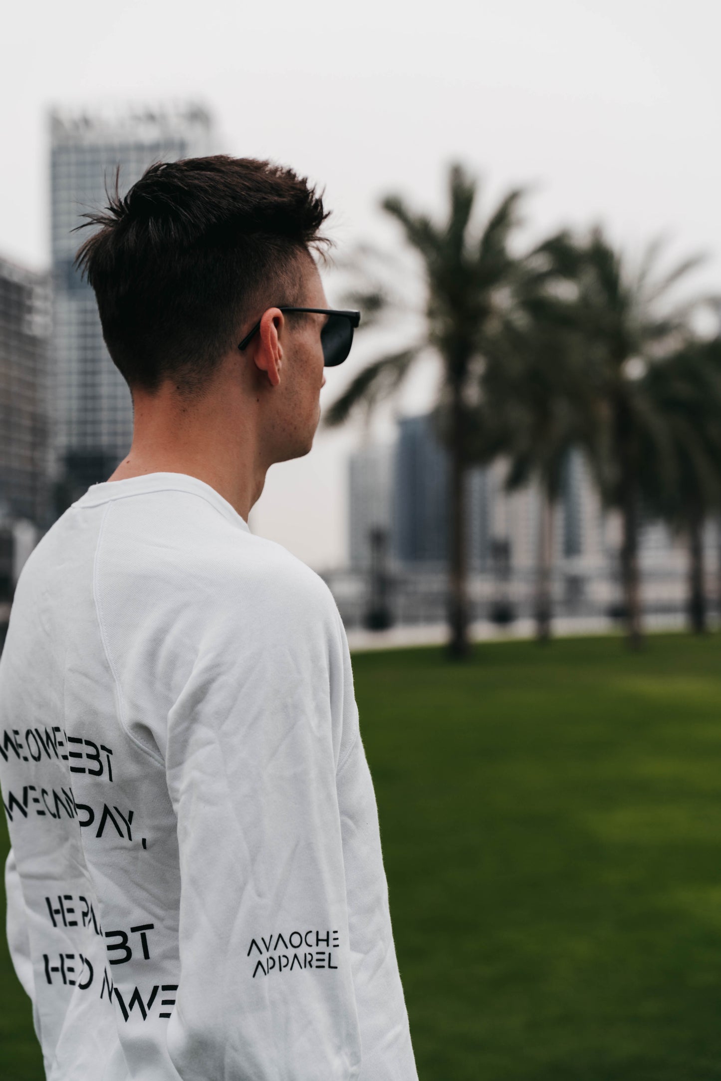 " WE OWE A DEBT.. " Men's White Crewneck